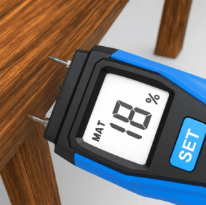 Firewood moisture meter is measuring wood